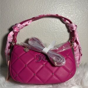 Juicy couture cherry scarf holding the line bag
